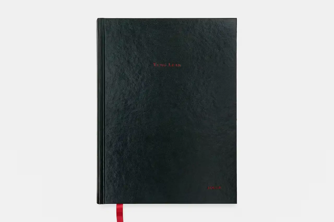 YUNG LEAN RELEASES IPHONE ARCHIVE BOOK image about musician Yung Lean's first book publication, containing ten years of personal iPhone content organized into themed chapters. The piece describes the book's physical design, content organization, and the artist's reflection on digital memory collection. (image 8 of 29)
