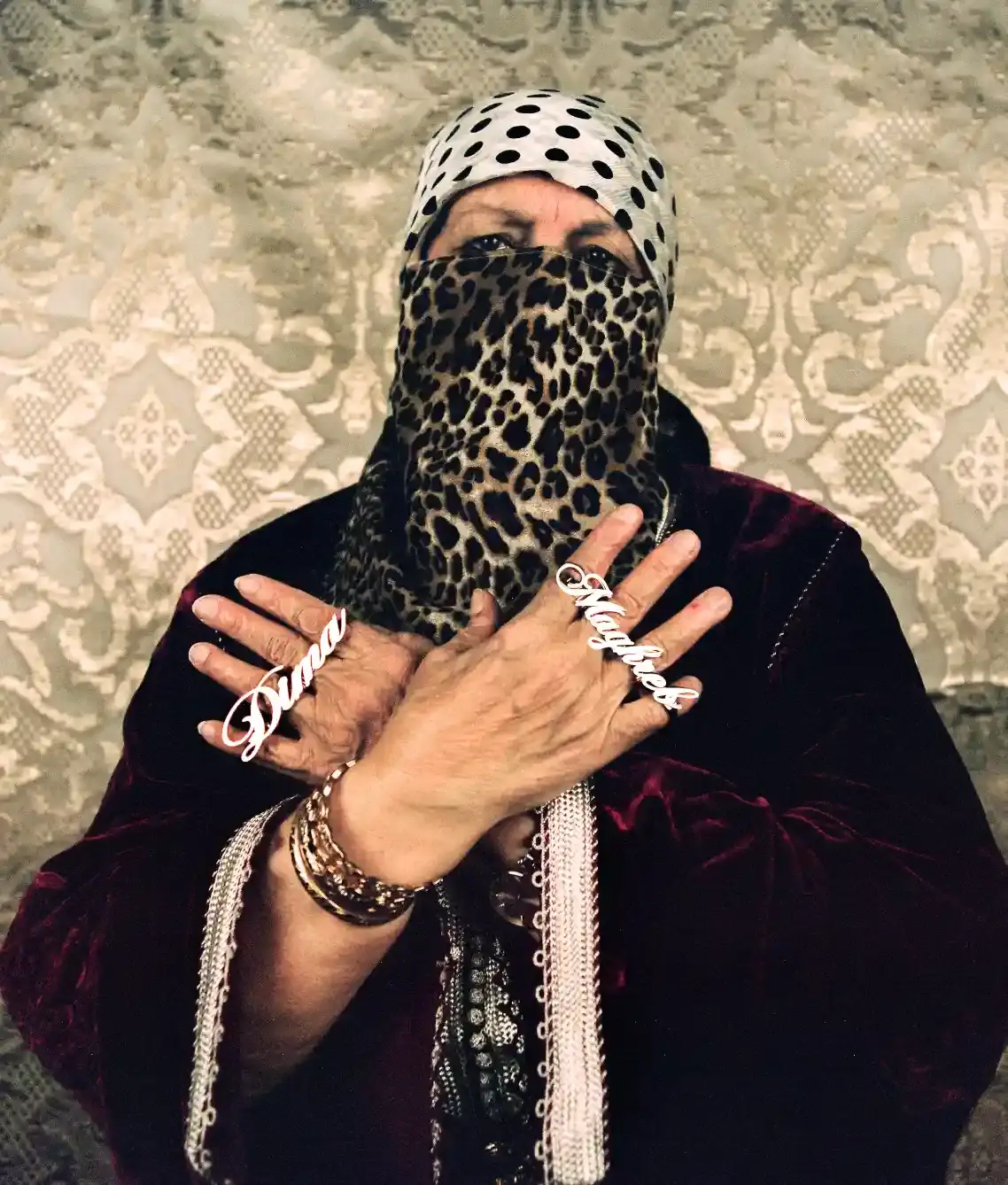 ZINA LOUHAICHY'S NEW RING COLLECTION Fashion designer Zina Louhaichy launches a collection of custom rings featuring photographs of her grandmother and aunt in traditional Moroccan clothing, photographed in her childhood home. (image 3 of 7)